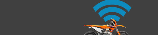 An orange off-road motorbike representing wireless GPS tracking and security