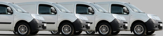 A row of white business vans ready for monitoring with DrivePro